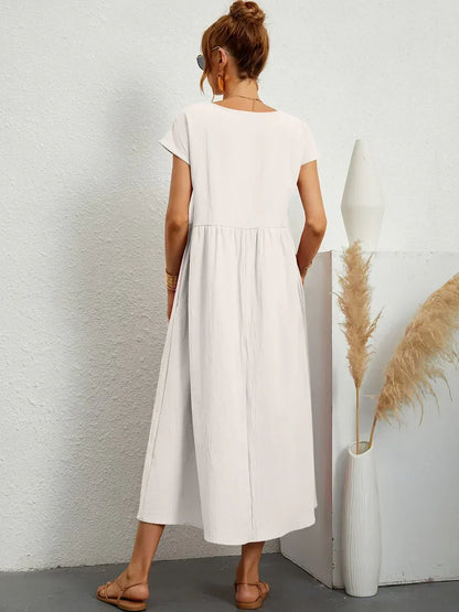 Gabrielle™ — Elegancka, midi sukienka o swobodnym kroju
